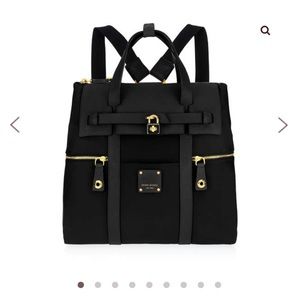 Henri Bendel jet setter